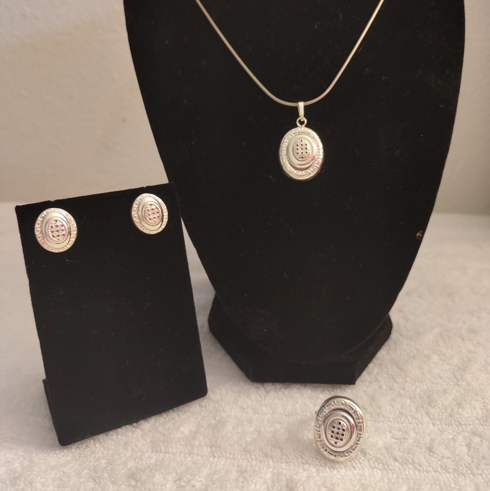 Sterling Silver Pendant with matching earrings and ring
